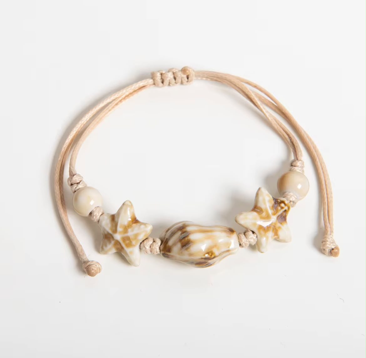 Pulsera de conchas