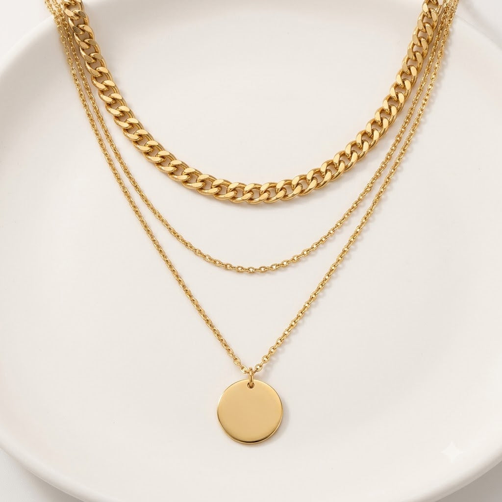 Juego de collares dorados